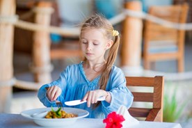 Teaching kids to use utensils